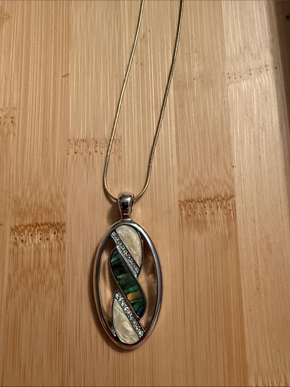 Silver Oval Pendant Necklace with Green Abalone and Pearlescent Inlay